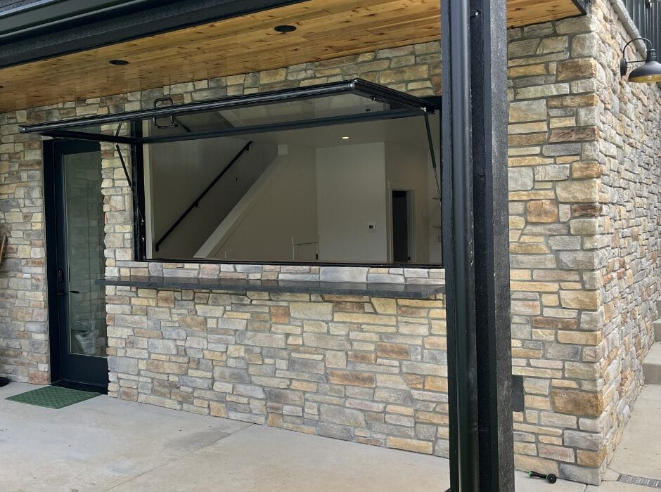 Lakefront Home with a Gas Strut Window