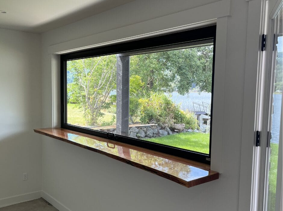 Lakefront Home with a Gas Strut Window
